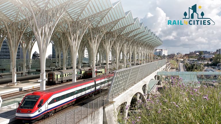 A modern high-speed train arrives at a contemporary railway station featuring a distinctive architectural design with white, tree-like steel columns and glass canopies. The station is surrounded by urban buildings, and a pedestrian bridge with greenery is visible in the foreground. The image also includes the 'RAIL4CITIES' logo in the top right corner.